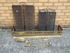 A brass fender, fire screens and similar.