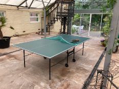 A full size table tennis table.