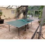 A full size table tennis table.