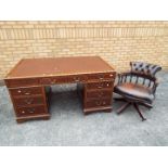 A leather topped pedestal desk, approximately 77 cm x 52 cm x 91 cm and a captains chair.