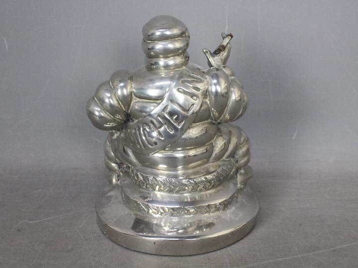 Automobilia - Bibendum: A chrome plated Michelin Man seated on two tyres and holding a spanner, - Image 5 of 6