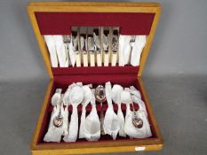 A six setting canteen of plated cutlery (appears unused)