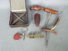 Lot to include a 19th century brass, rocker type, sovereign scale or balance, corkscrews,