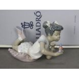 Lladro - A boxed figurine entitled Sing With Me, # 5837, depicting a young girl with a small bird,