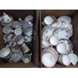 Two boxes of mixed ceramics.