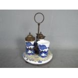 Staffordshire Pottery - a Blue and White ceramic cruet set,