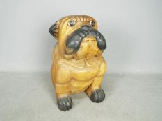 A carved wooden model of a bulldog, approximately 30 cm (h).