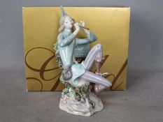 Lladro - A boxed Lladro Privilege Gold figurine, The Pied Piper Of Hamlin, # 8425,