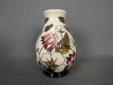 Moorcroft - a Moorcroft vase in the Bramble Revisited design,