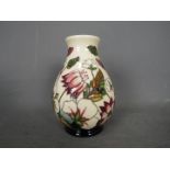 Moorcroft - a Moorcroft vase in the Bramble Revisited design,