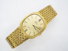 Omega - An 18ct gold cased Omega De Ville wristwatch on 18ct gold,