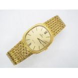 Omega - An 18ct gold cased Omega De Ville wristwatch on 18ct gold,