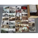 In excess of over 500 Early-Mid century period UK and foreign postcards to include real photos,
