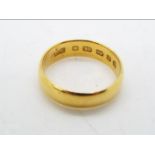 A 22ct gold wedding band, size I½, approximately 3.8 grams all in.