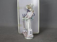 Lladro - A boxed figurine entitled Garden Song, # 7618,