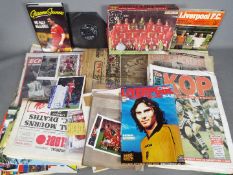 Sporting - a collection of Liverpool football club memorabilia and ephemera to include photographs,