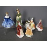 Three Royal Doulton figurines comprising Meditation HN2330, Paisley Shawl HN1988 and Nina HN2347,