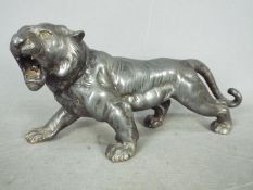 A Japanese pewter tiger,