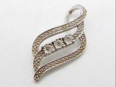 A Diamond Sterling Silver Halo Diamond pendant issued in a limited edition 1 of 50 set with three