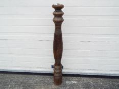 A very large pepper mill,