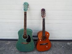 Two acoustic guitars comprising an Earthfire Autumn Leaves and one other.