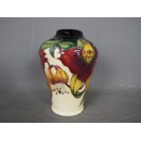 Moorcroft - a Moorcroft vase in the Anna Lily design,