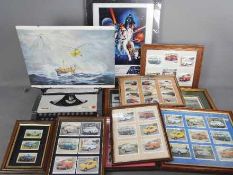 A framed Star Wars print and a quantity of framed cigarette cards / trade cards,