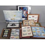 A framed Star Wars print and a quantity of framed cigarette cards / trade cards,