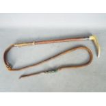 A vintage antler handled hunting whip by George Parker & Sons,