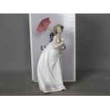 Lladro - A boxed Collectors Society figurine for 1995 entitled Afternoon Promenade, # 7636,