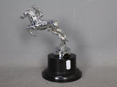 Automobilia - A Desmo car mascot in the form of a horse and jockey,