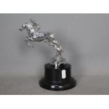 Automobilia - A Desmo car mascot in the form of a horse and jockey,