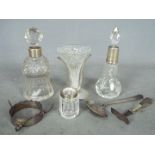 Lot to include silver mounted scent bottles, silver spoon and pusher,