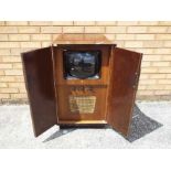A vintage EKCO television cabinet measuring approximately 84 cm x 53 cm x 45 cm.