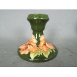 Moorcroft - a Moorcroft candlestick,