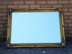 Large bevel edged mirror, approximately 75 cm x 105 cm.