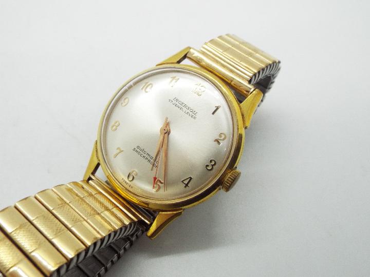 A Tressa Laser Beam gold plated wristwatch on gold plated expanding bracelet and a similar Ingersol - Image 2 of 3