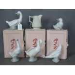 Nao - Three boxed figurines of ducks, two unboxed and a Portmeirion Parian jug.