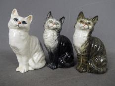 Beswick - Three Beswick cat figurines, all shape # 1030, different colourways, approximately 15.