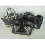 A Gucci black leather tote shoulder bag, style number 105376 and two further handbags.