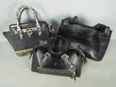A Gucci black leather tote shoulder bag, style number 105376 and two further handbags.