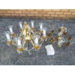 A modern chandelier, approx 60 cm (diam) and one smaller chandelier.