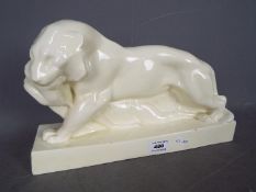 A Wedgewood Escape John Skeaping figurine depicting a Tiger and Buck,