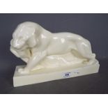 A Wedgewood Escape John Skeaping figurine depicting a Tiger and Buck,