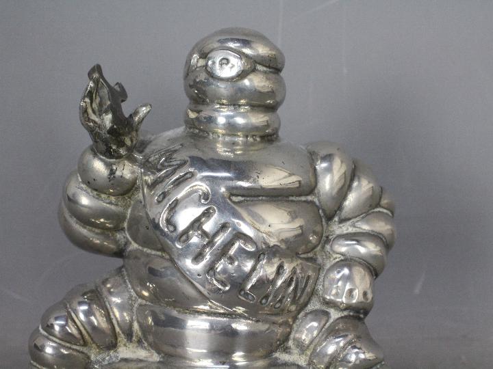 Automobilia - Bibendum: A chrome plated Michelin Man seated on two tyres and holding a spanner, - Image 2 of 6