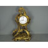 A decorative Rococo or Art Nouveau styled French mantel clock,