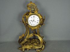 A decorative Rococo or Art Nouveau styled French mantel clock,