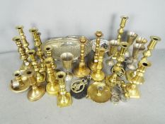A collection of metalware to include brass,