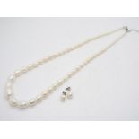 An unenhanced Cultured Pearl Graduated necklace set with sterling silver issued in a limited