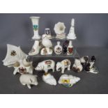 A collection of crested ware, eighteen pieces in total,